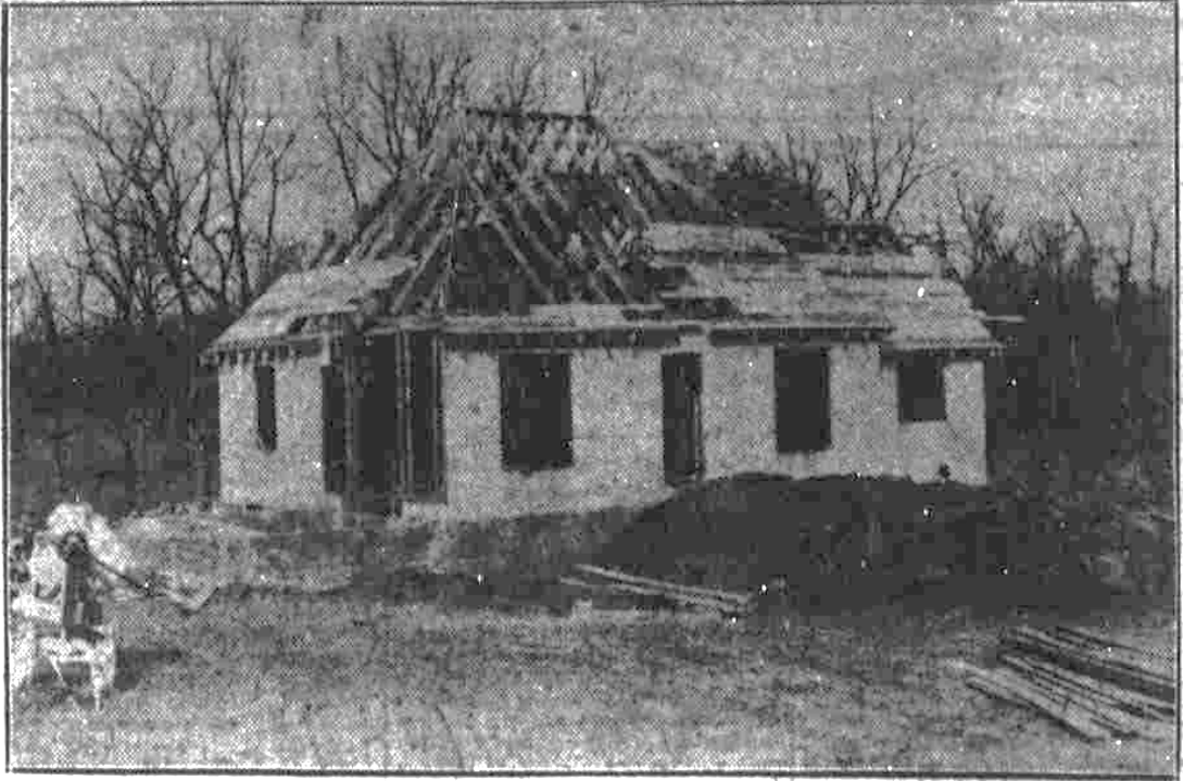 The Model Home under construction, wood frame